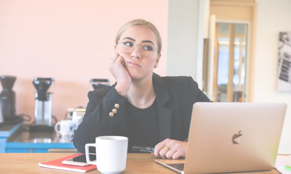 A woman looking discouraged.